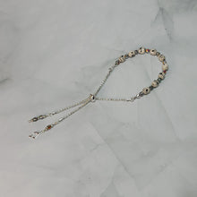 Load image into Gallery viewer, Sheet Music Slider Knot Paper Bead Bracelet w/ silver glass spacer beads & silver music note charm