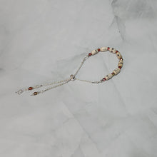 Load image into Gallery viewer, Sheet Music Slider Knot Paper Bead Bracelet w/ pink/green glass spacer beads & silver music note charm