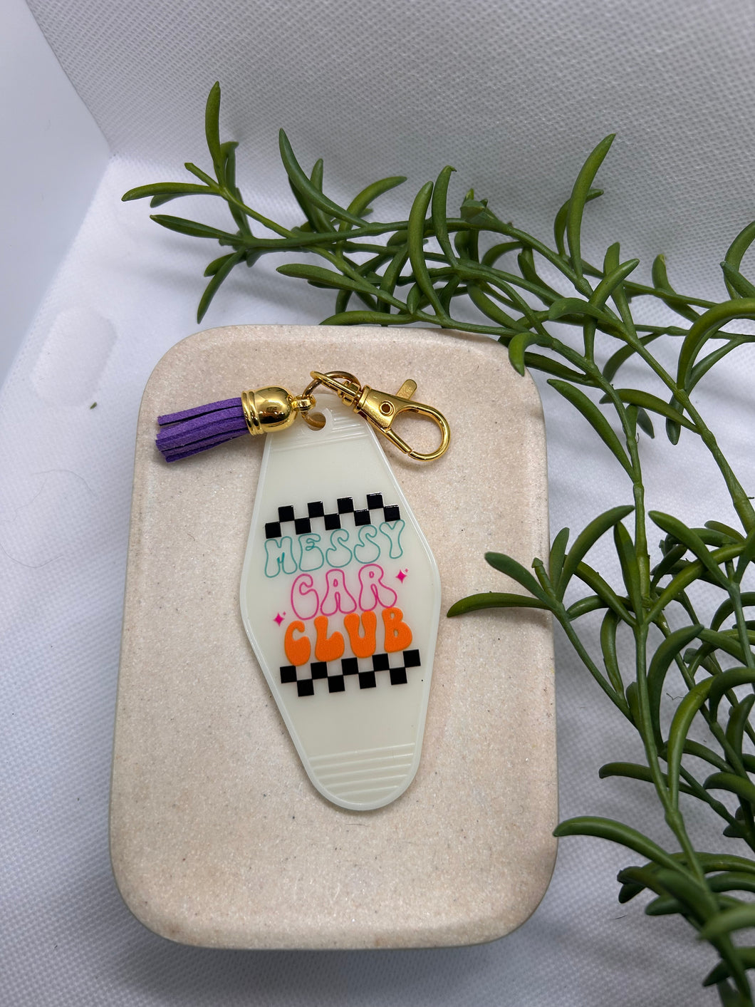 “Messy car club” glow in the dark motel style keychain