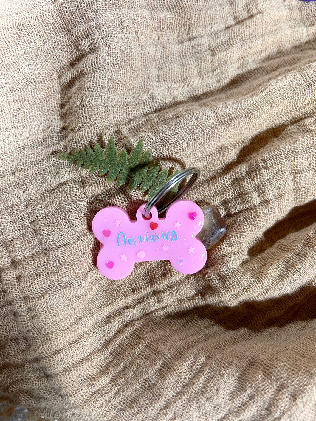 “Anxious” sparkly pink bone pet tag