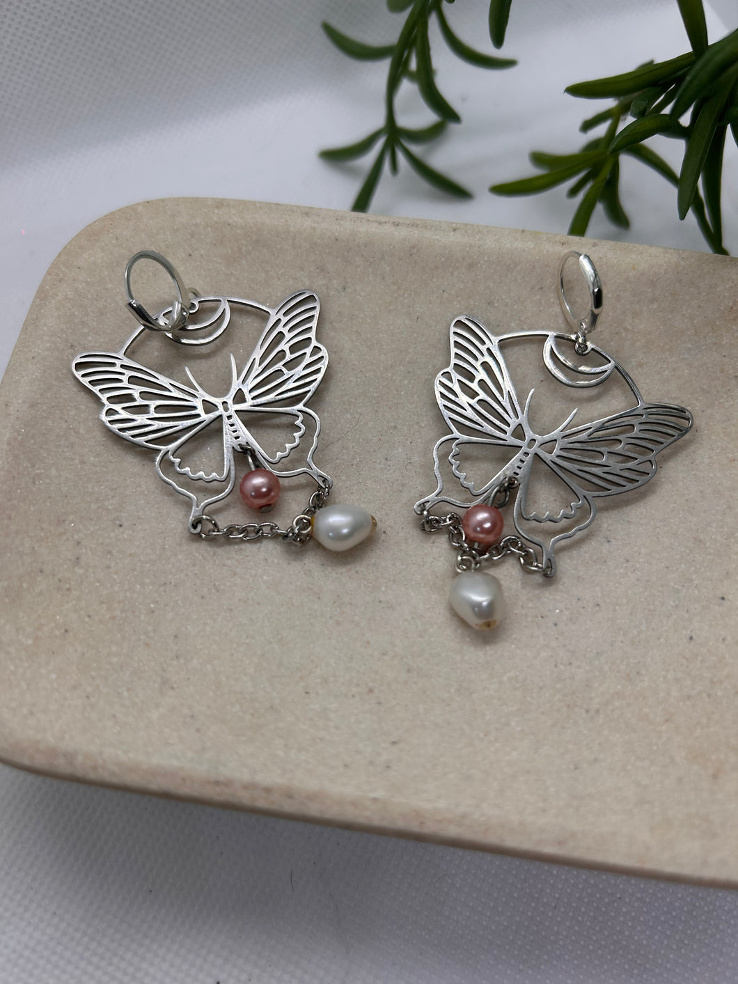 Pearl butterfly huggie earrings