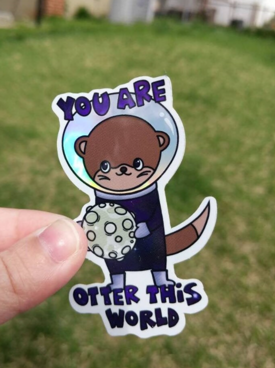 Holographic Otter This World Sticker