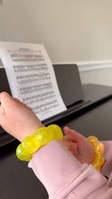 Load image into Gallery viewer, orange Feelzies™ Original Squishy Bracelet: Sunburst Orange fidget
